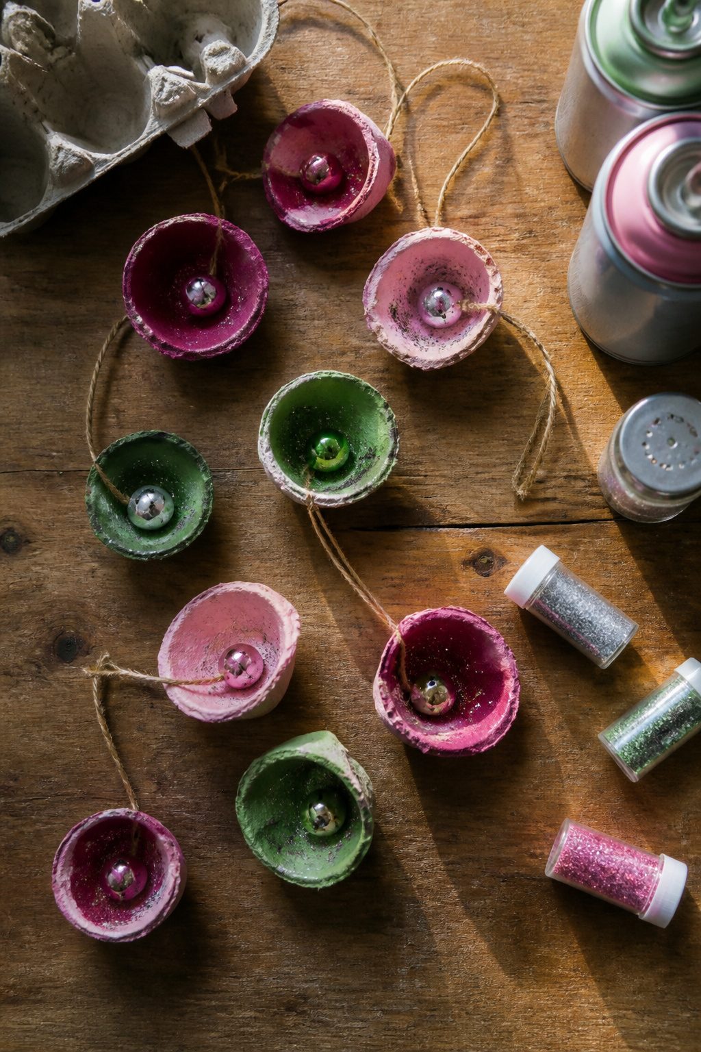 Jingle bell ornaments made from egg carton cups.
