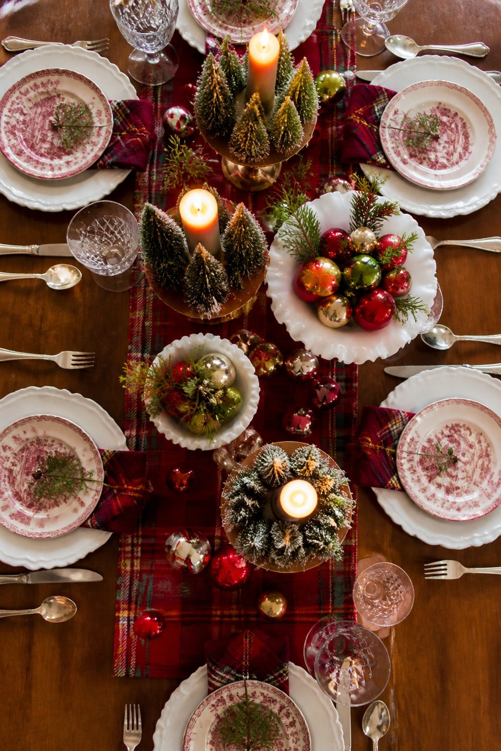 Vintage Christmas Display: Ornaments, Trees, Cards & Ephemera 20 Candle rings and decorations on a dining table.